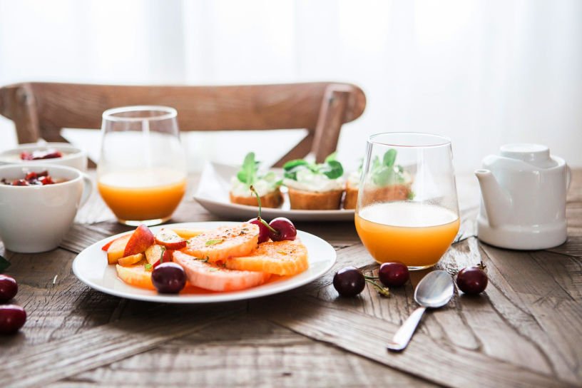 breakfast plates and glasses in tidy kitchen