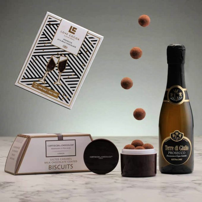 Gift guide for foodies hamper prosecco and chocolate